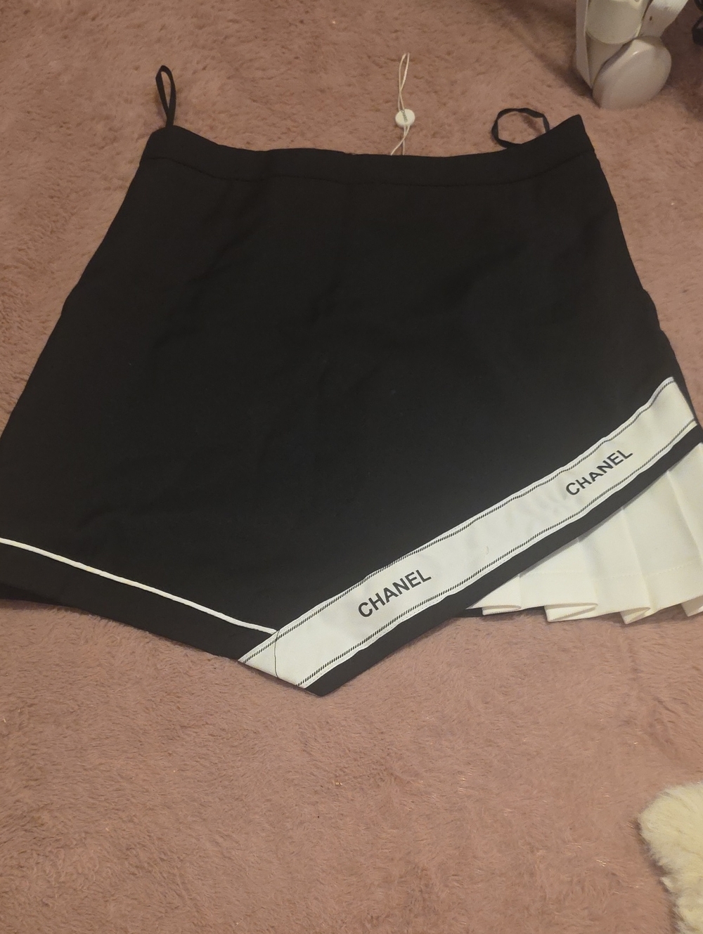 CHANEL Black and White Asymmetrical Skirt with Logo Trim